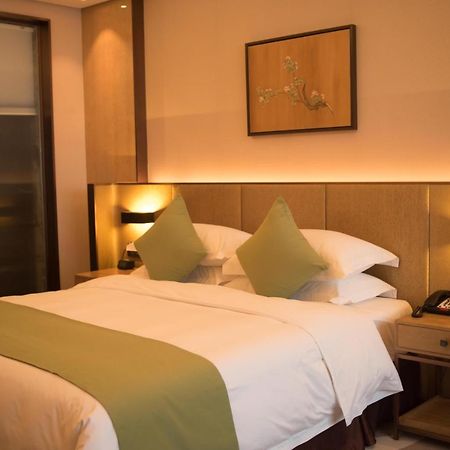 Leshan Ramada Hotel Buitenkant foto