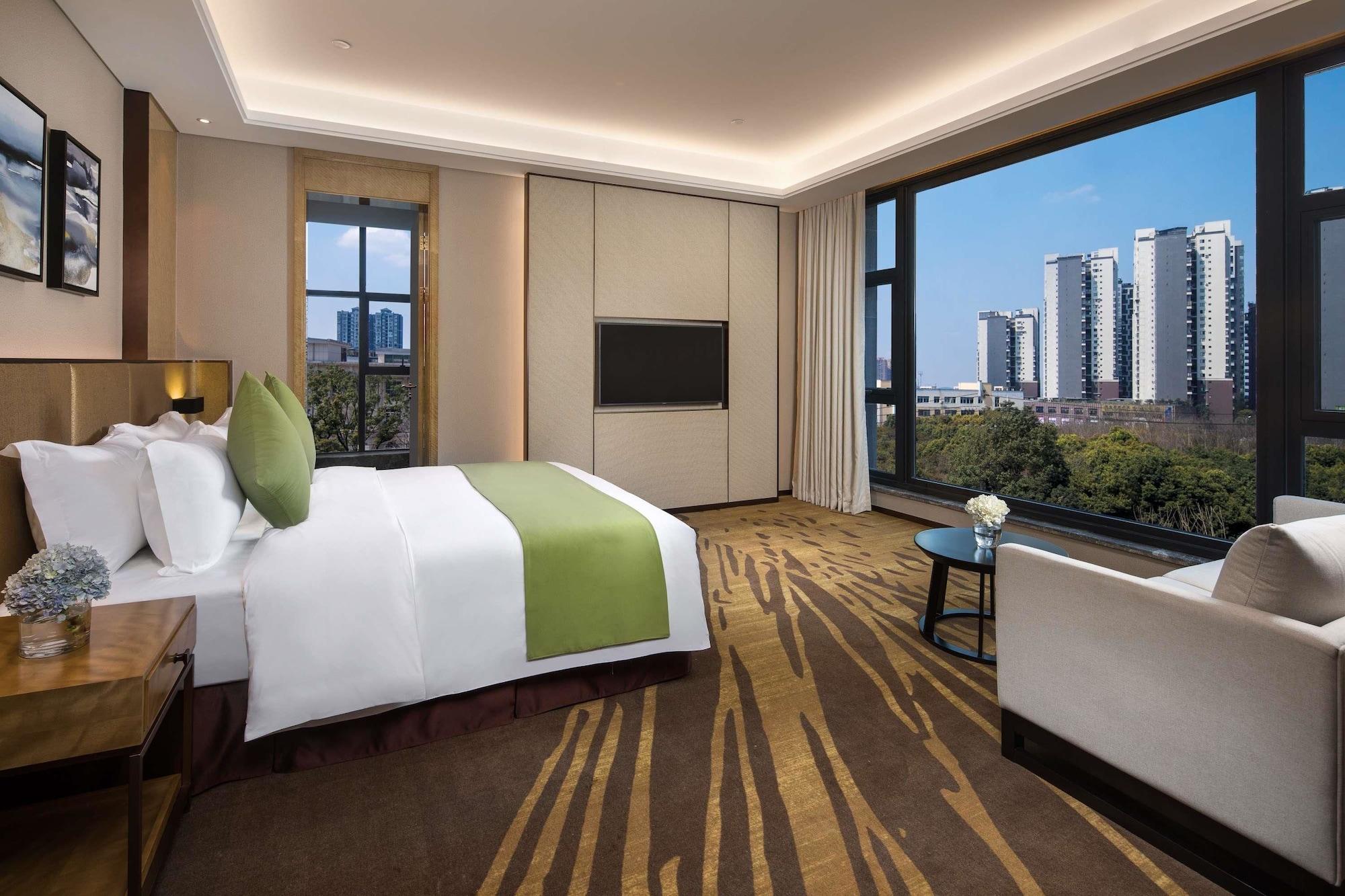 Leshan Ramada Hotel Buitenkant foto
