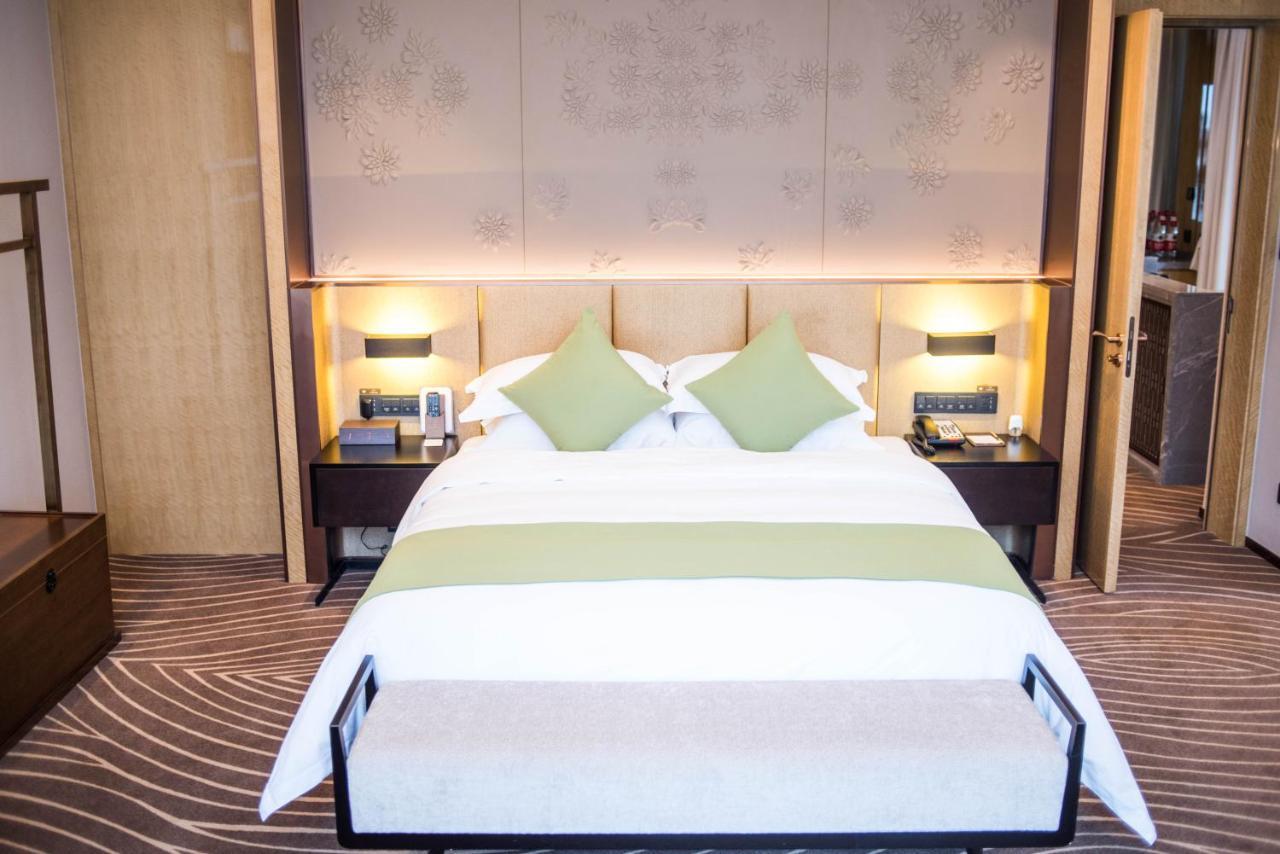 Leshan Ramada Hotel Buitenkant foto