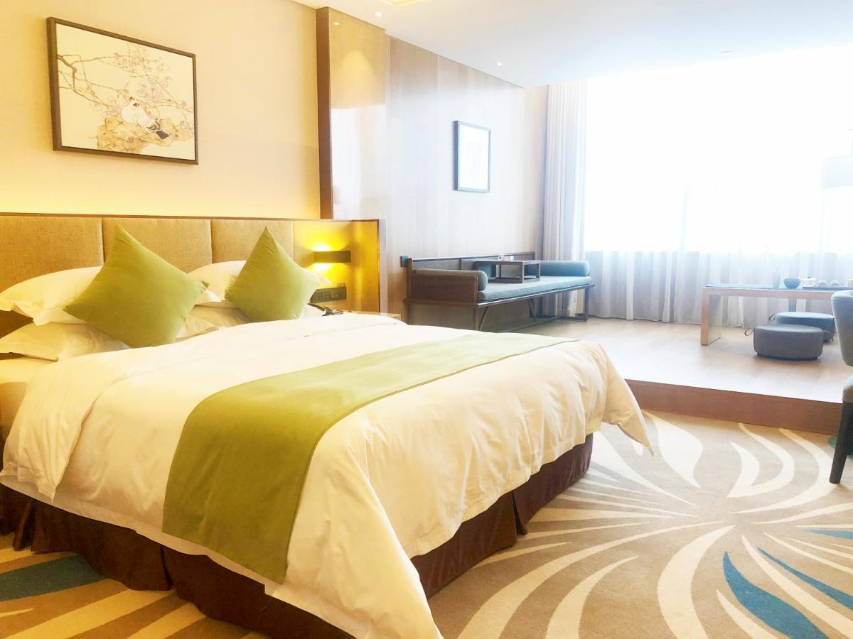 Leshan Ramada Hotel Buitenkant foto