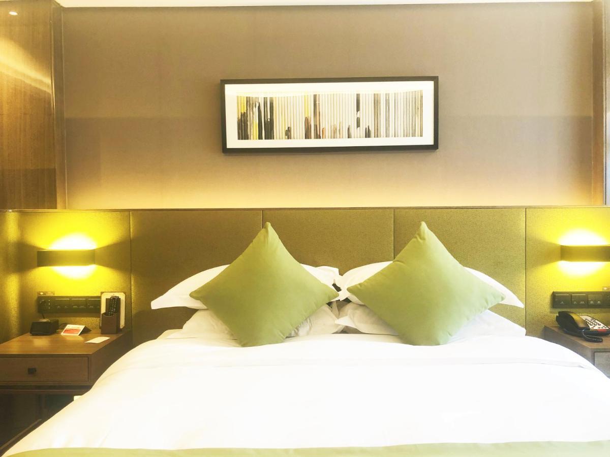 Leshan Ramada Hotel Buitenkant foto