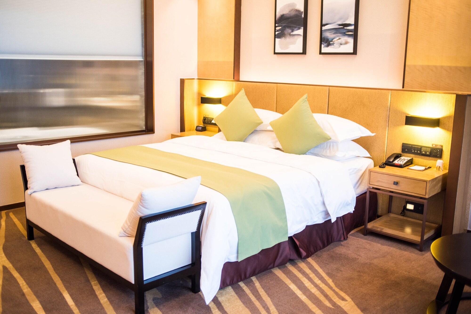 Leshan Ramada Hotel Buitenkant foto