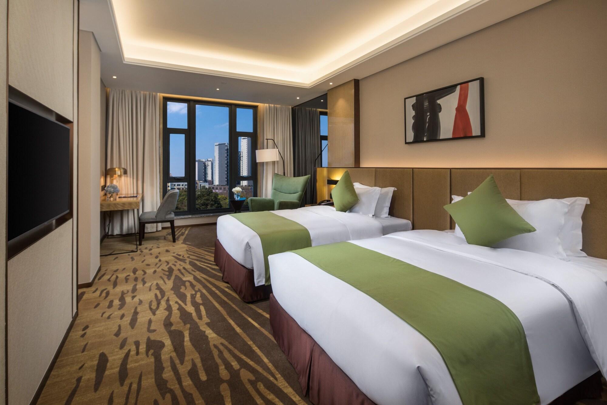 Leshan Ramada Hotel Buitenkant foto