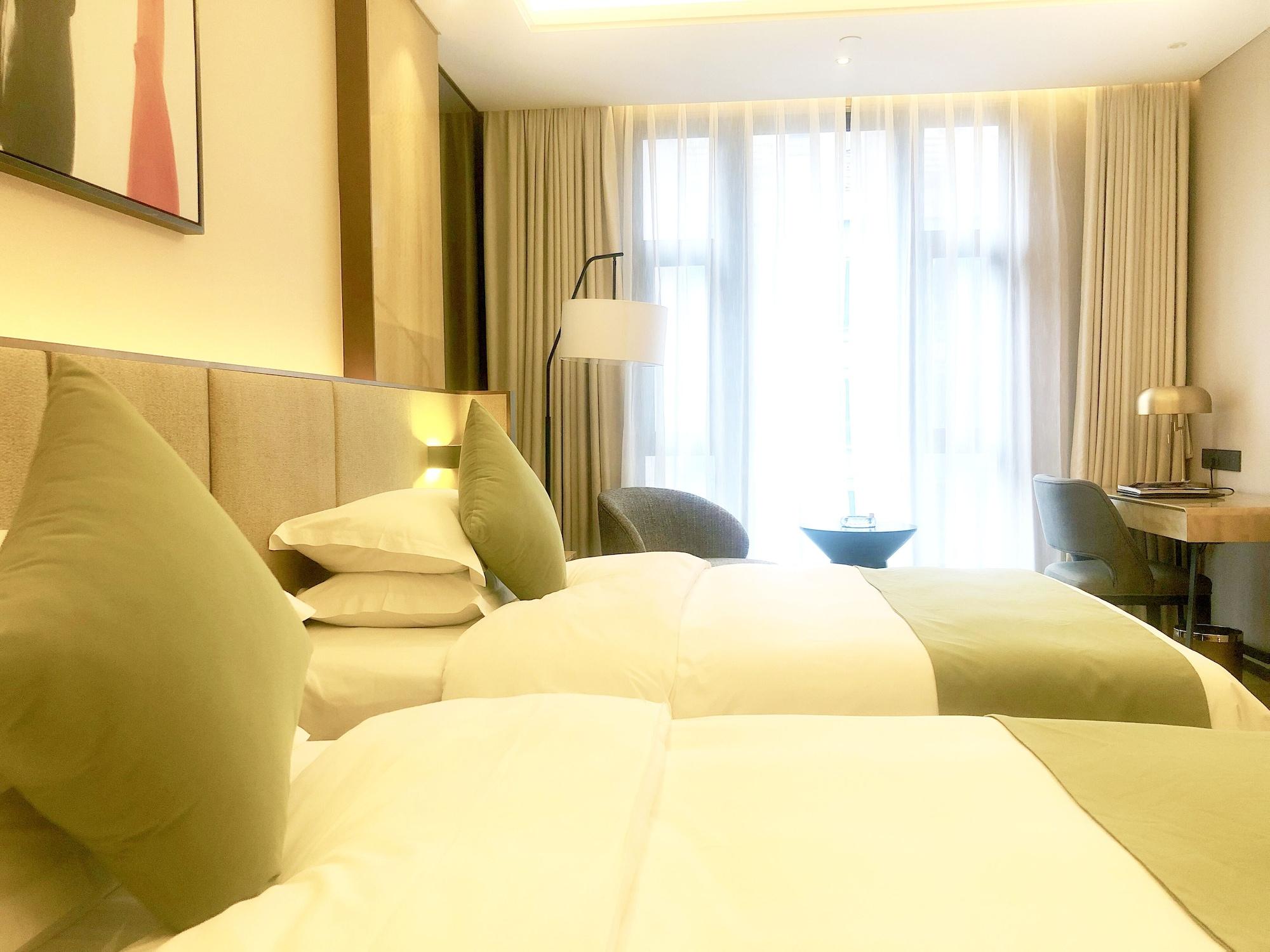 Leshan Ramada Hotel Buitenkant foto