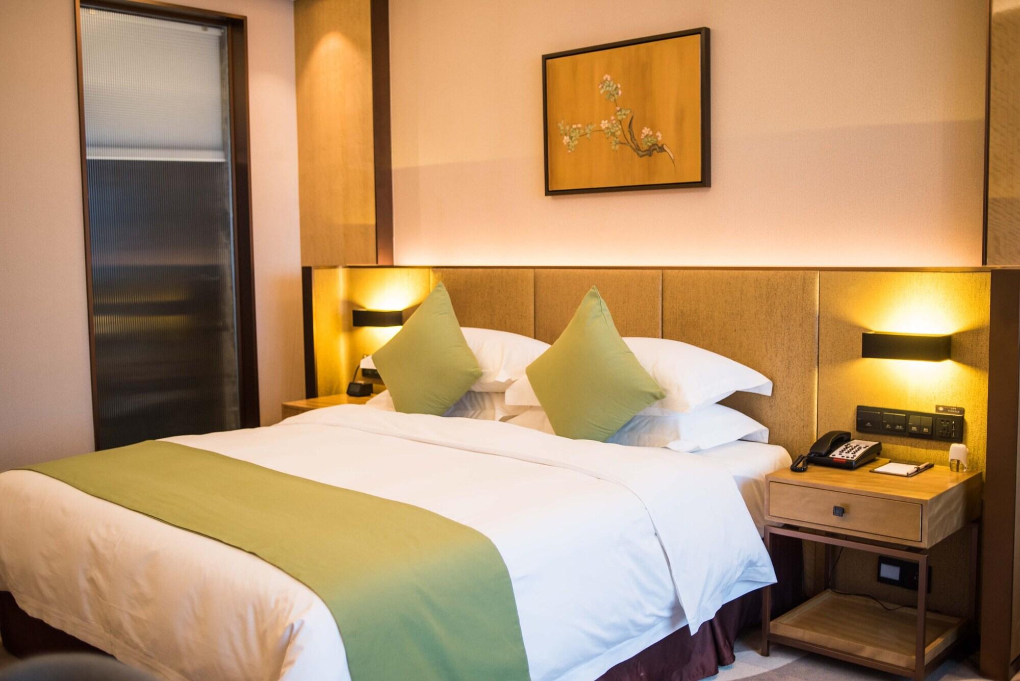 Leshan Ramada Hotel Buitenkant foto