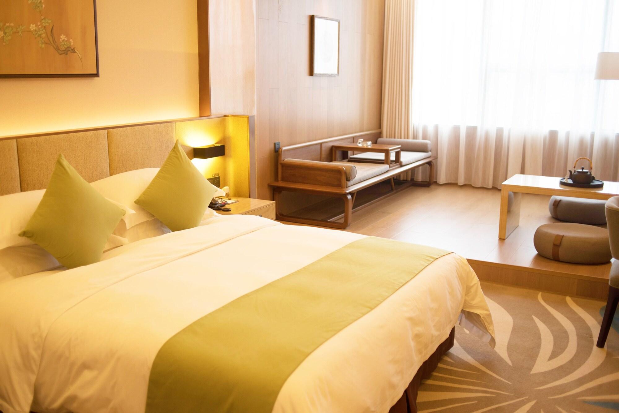 Leshan Ramada Hotel Buitenkant foto