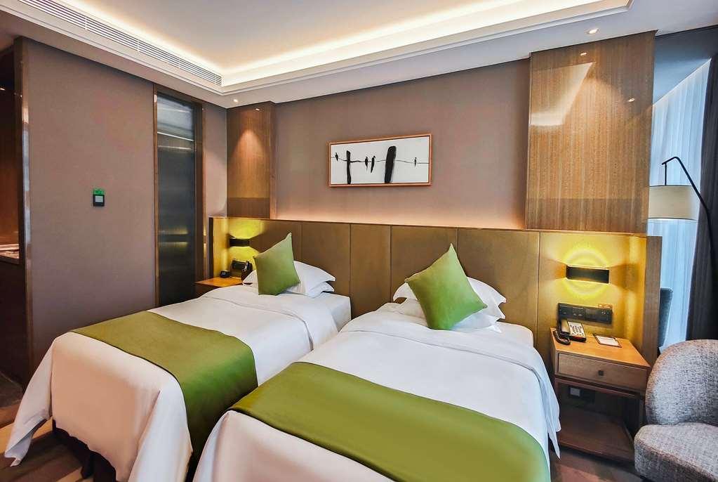 Leshan Ramada Hotel Kamer foto