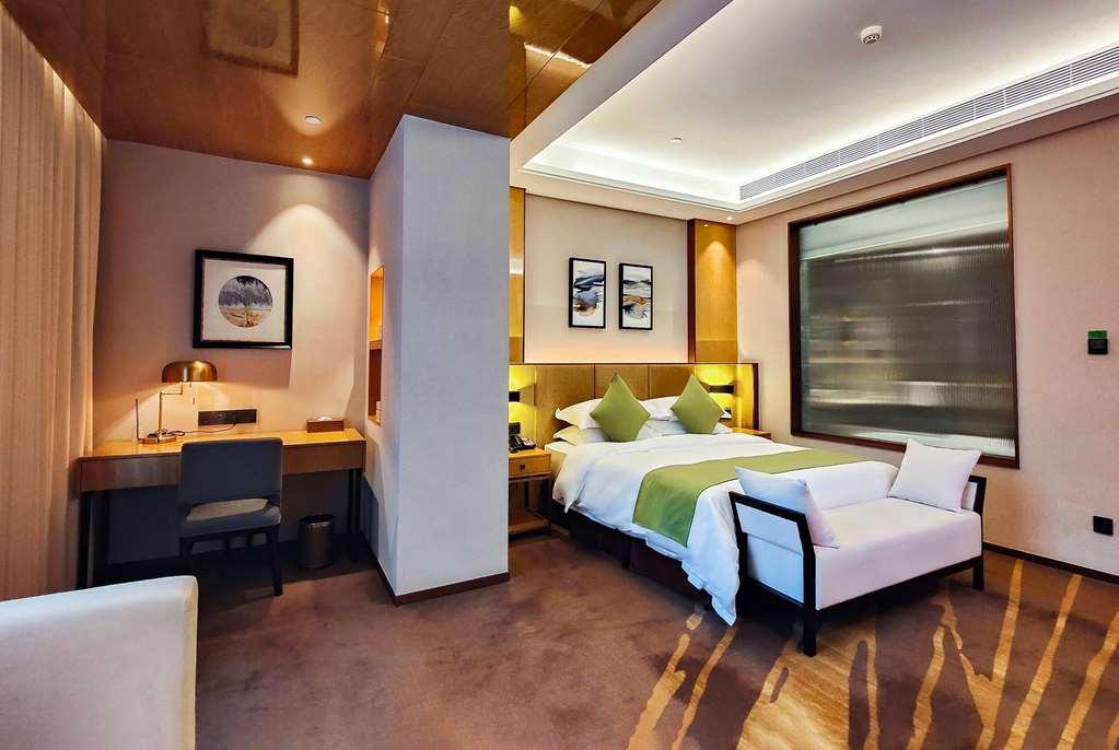 Leshan Ramada Hotel Kamer foto