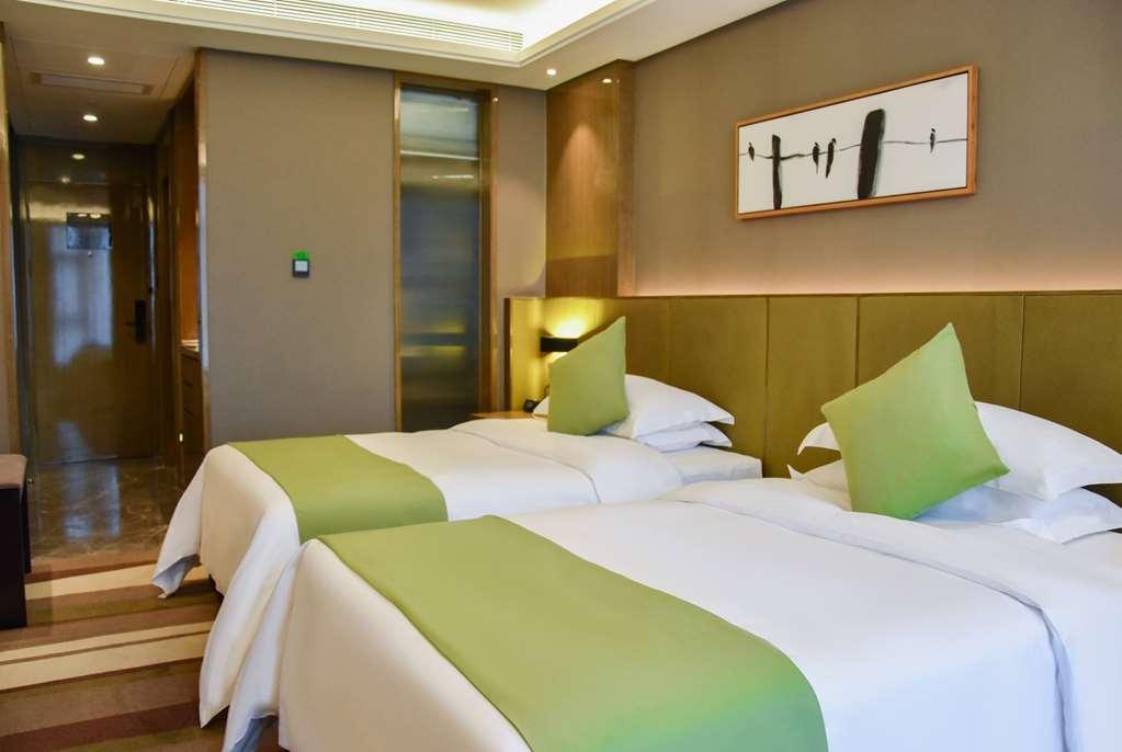 Leshan Ramada Hotel Kamer foto