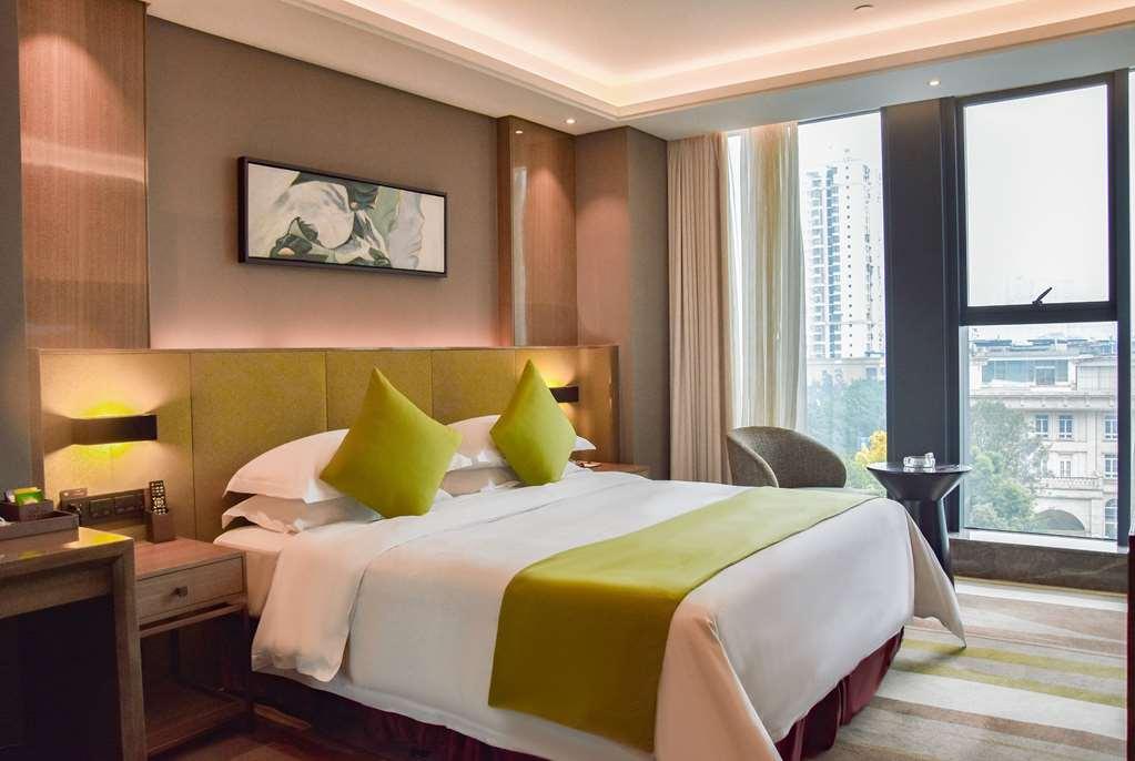 Leshan Ramada Hotel Kamer foto