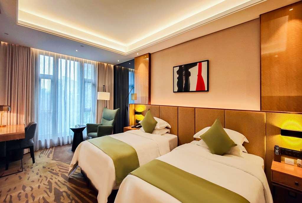 Leshan Ramada Hotel Kamer foto