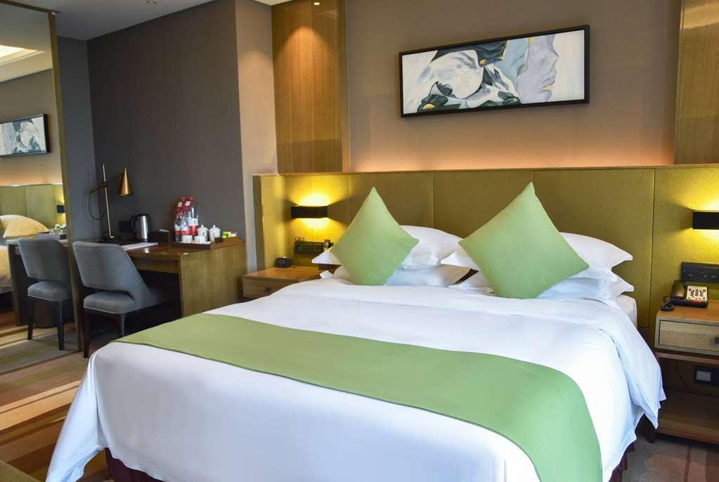 Leshan Ramada Hotel Kamer foto
