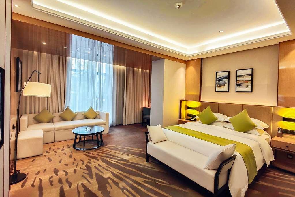 Leshan Ramada Hotel Kamer foto