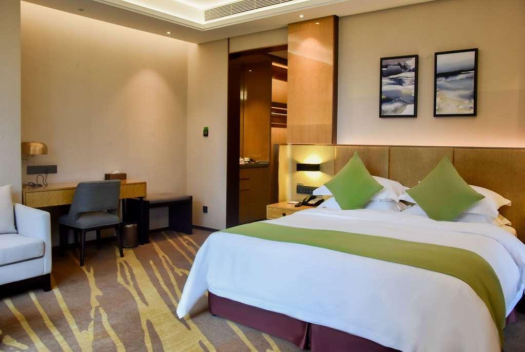 Leshan Ramada Hotel Kamer foto