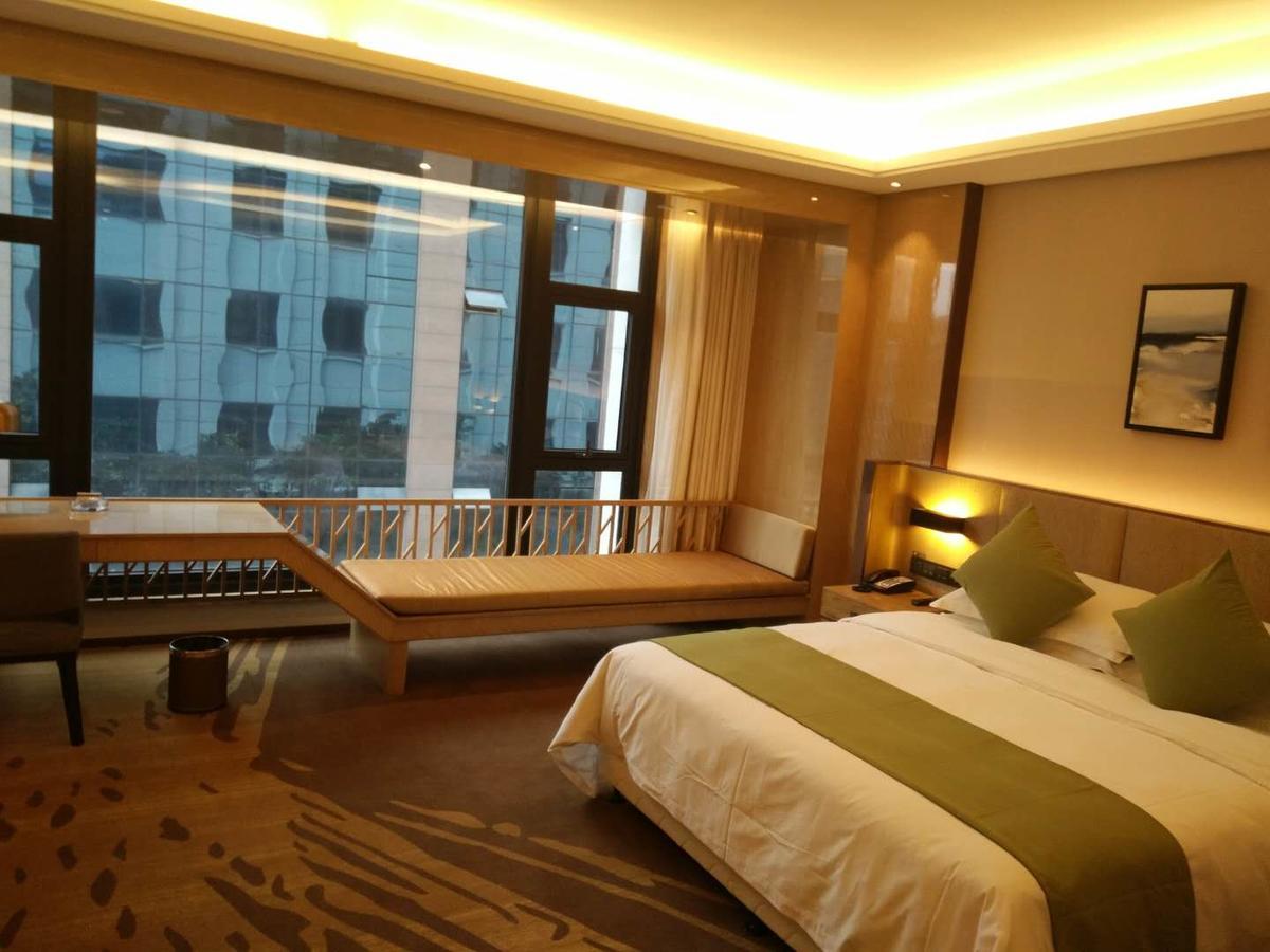Leshan Ramada Hotel Kamer foto
