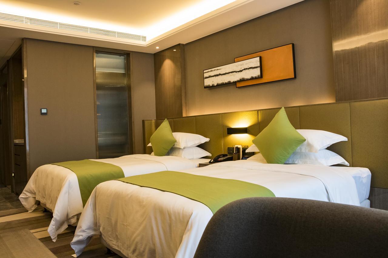 Leshan Ramada Hotel Buitenkant foto