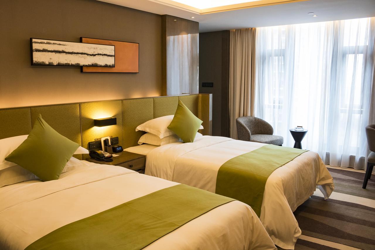 Leshan Ramada Hotel Buitenkant foto
