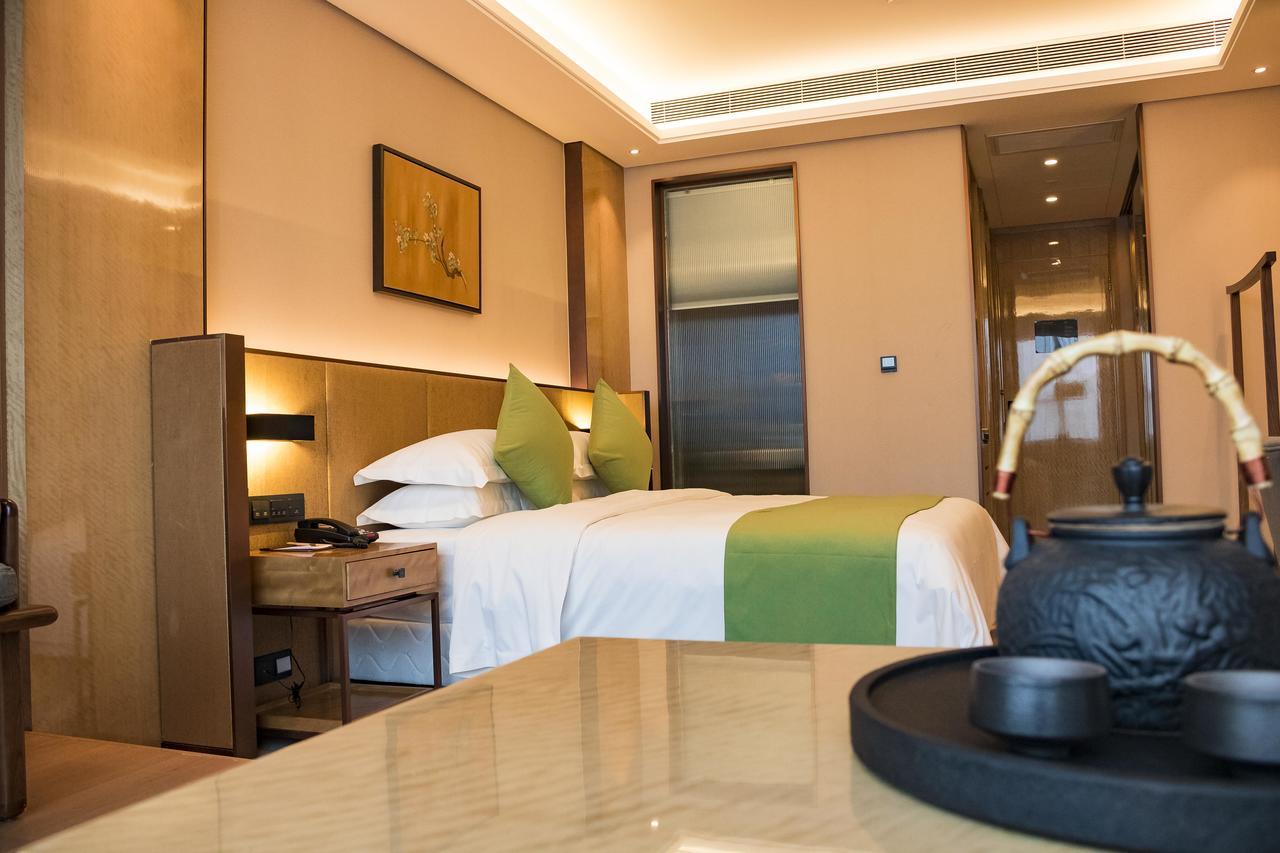 Leshan Ramada Hotel Buitenkant foto