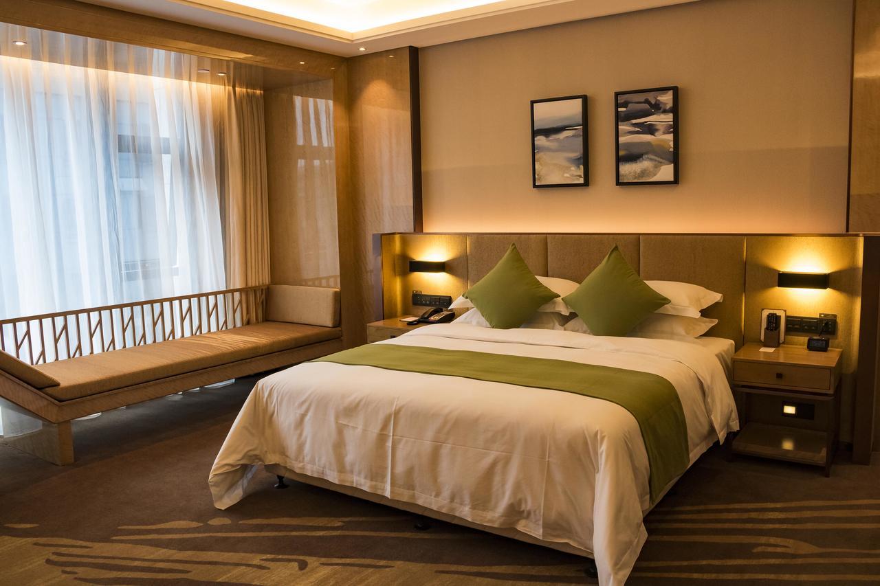 Leshan Ramada Hotel Buitenkant foto
