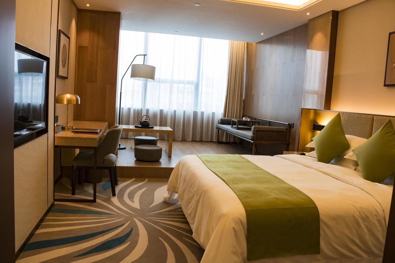 Leshan Ramada Hotel Buitenkant foto