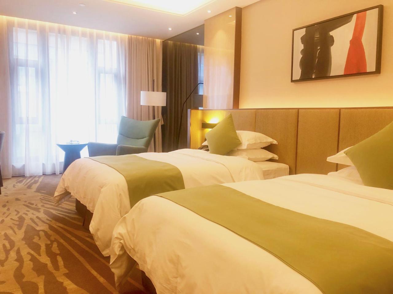 Leshan Ramada Hotel Buitenkant foto