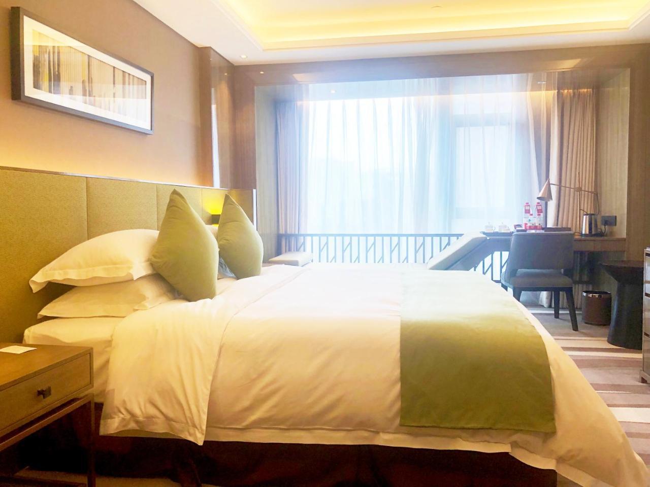 Leshan Ramada Hotel Buitenkant foto