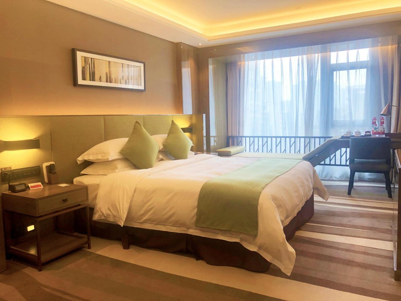 Leshan Ramada Hotel Buitenkant foto